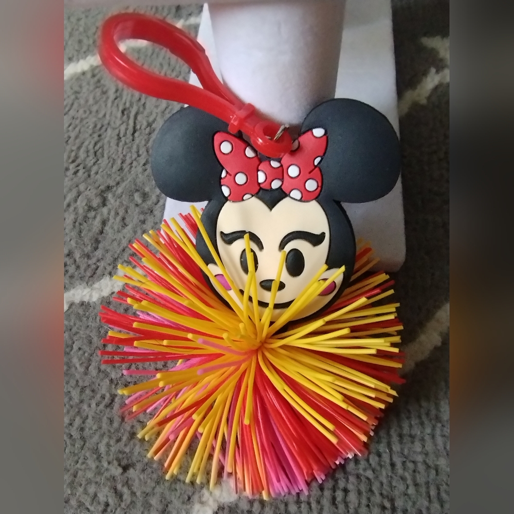 Disney Minnie Mouse Koosh Squish Bag Charm, resembles Frida Kahlo